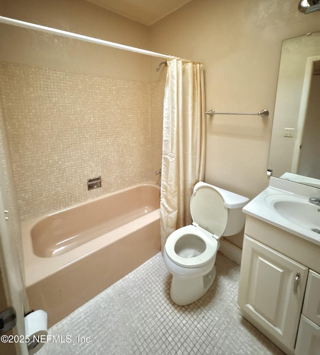 full bathroom featuring tile patterned flooring, vanity, shower / tub combo with curtain, and toilet