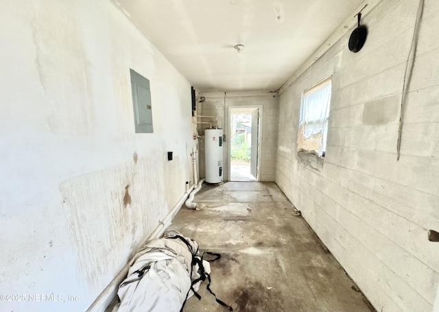 hallway with water heater and electric panel