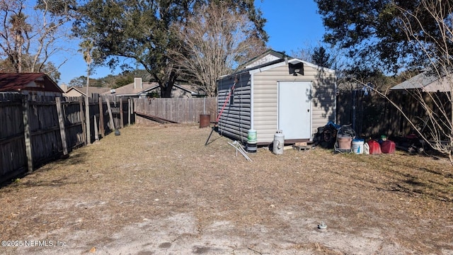 view of yard with a storage unit