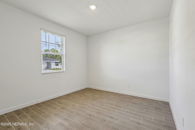 25 Ararat Dr, Palm Coast, FL 32137 - spare room featuring light wood finished floors and baseboards