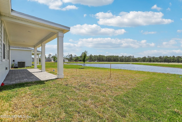 25 Ararat Dr, Palm Coast, FL 32137 - view of yard with a patio area, central AC, and a water view
