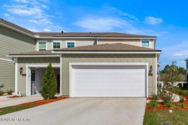 view of front of property featuring a garage