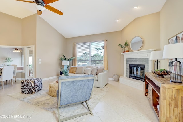 living room featuring ceiling fan, high vaulted ceiling, and light tile patterned floors