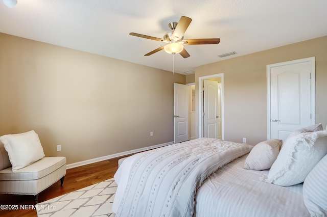 bedroom featuring ceiling fan and light hardwood / wood-style flooring