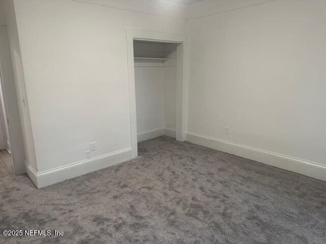 939 Jasmine Pl, Jacksonville, FL 32205 - unfurnished bedroom featuring carpet and a closet