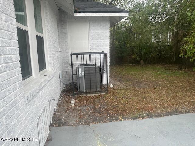939 Jasmine Pl, Jacksonville, FL 32205 - view of side of home with central AC