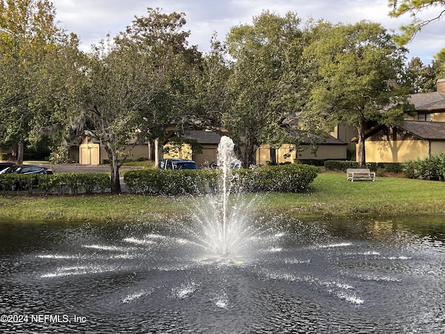 view of property's community featuring a water view