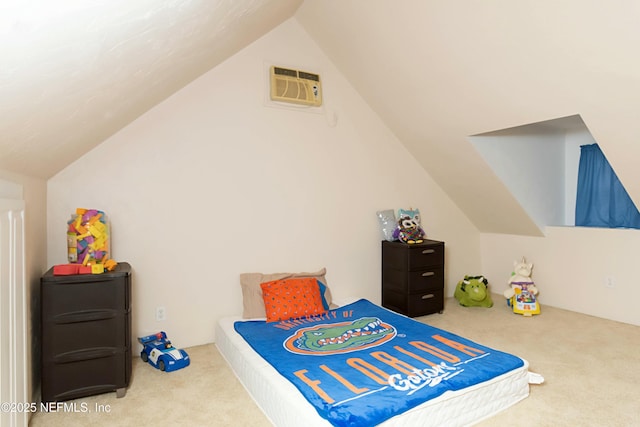 carpeted bedroom with lofted ceiling and a wall mounted air conditioner