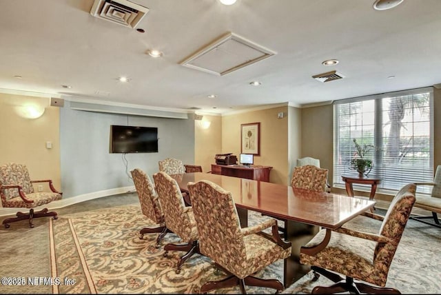dining room featuring ornamental molding