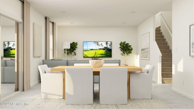 dining room with light hardwood / wood-style floors