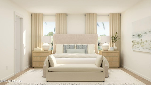 bedroom featuring multiple windows and light colored carpet