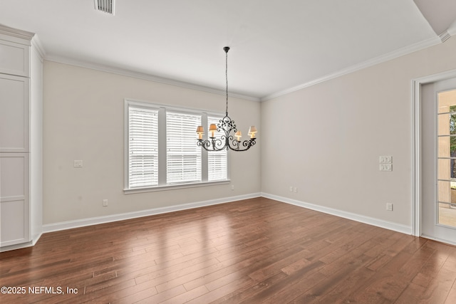 unfurnished dining area with crown molding, dark hardwood / wood-style flooring, and a notable chandelier