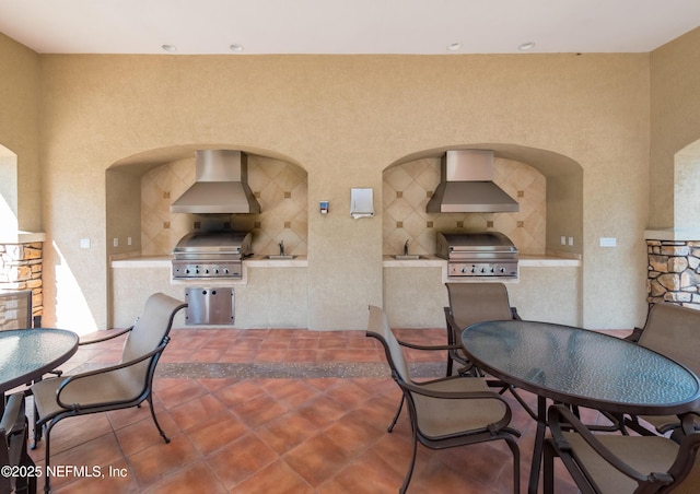 tiled dining room with sink