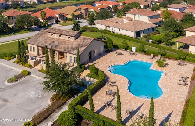 view of swimming pool with a patio area