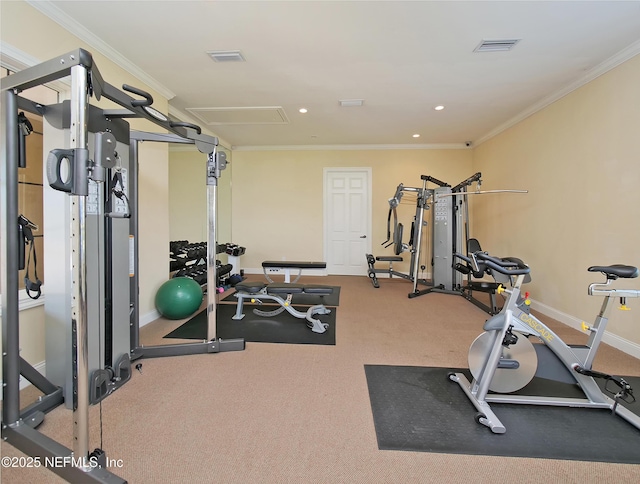 workout room featuring ornamental molding