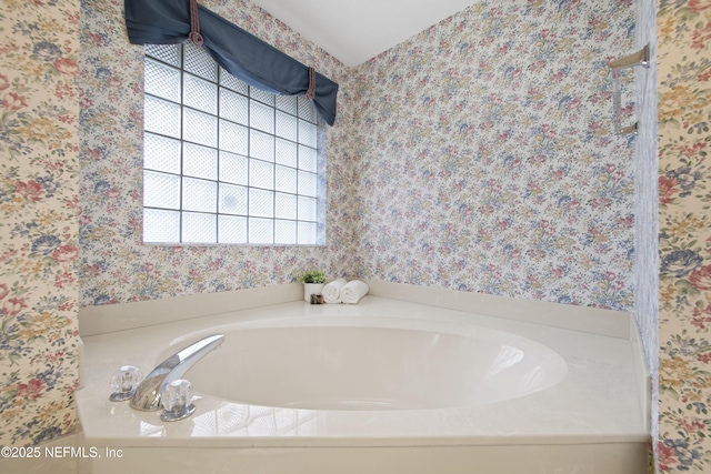 bathroom with a washtub