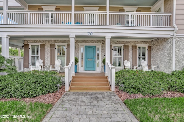 doorway to property featuring a balcony