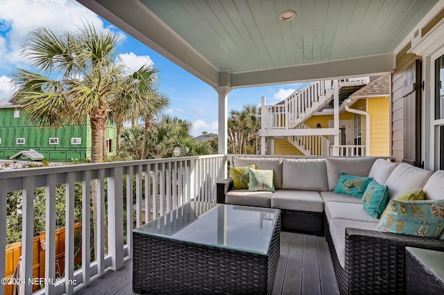 deck with an outdoor hangout area