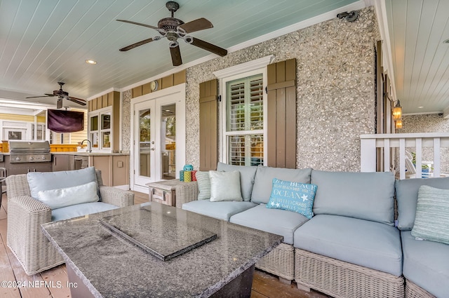 view of patio / terrace featuring sink, area for grilling, an outdoor kitchen, and ceiling fan