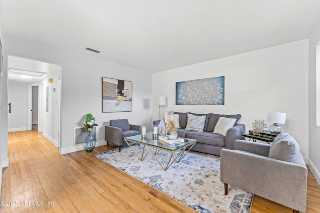 living room with wood-type flooring