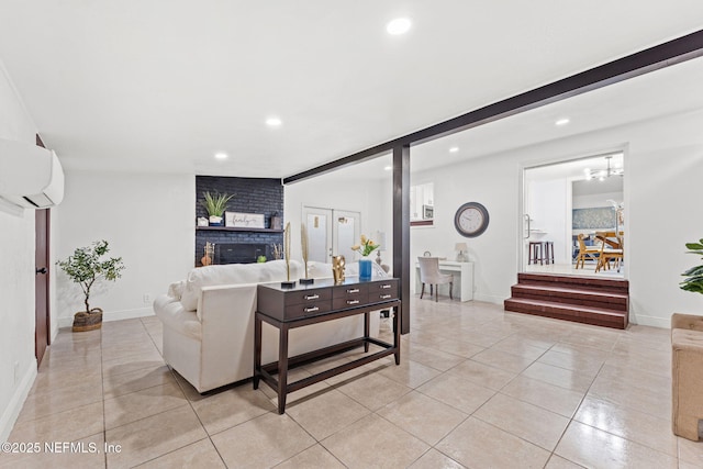 tiled living room featuring beam ceiling and an AC wall unit