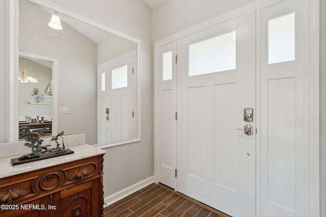 entrance foyer with an inviting chandelier