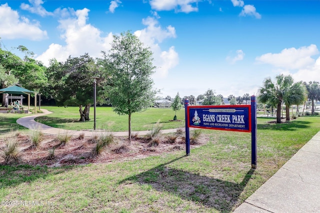 view of property's community featuring a yard and a gazebo