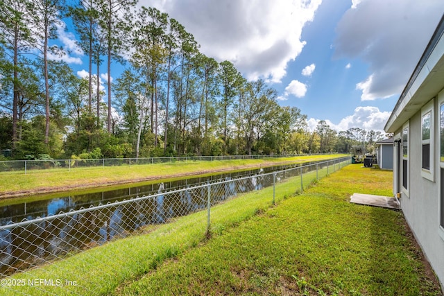 view of yard featuring a water view