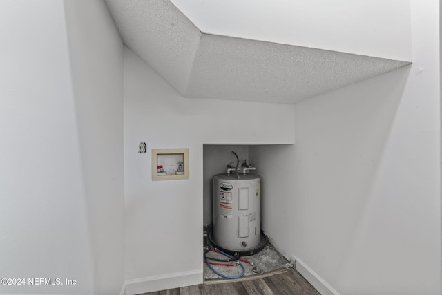 utility room featuring water heater