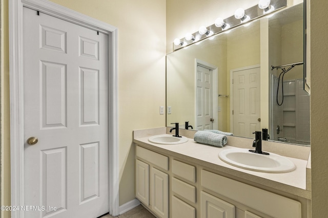 bathroom with vanity and walk in shower