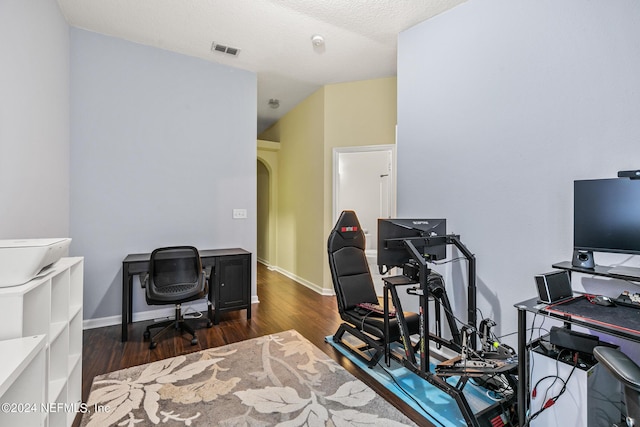 office with dark wood-type flooring