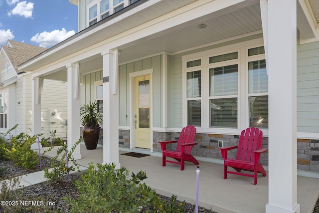 view of patio featuring a porch