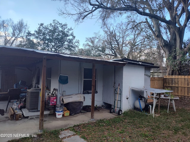 exterior space featuring central AC unit