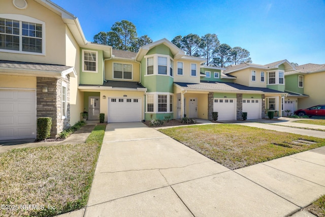 multi unit property featuring a garage