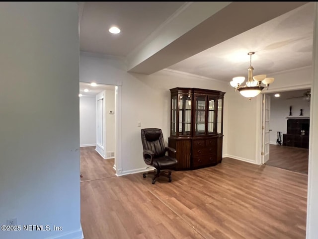 816 Middleton Rd, Jacksonville, FL 32211 - living area with crown molding, wood finished floors, a chandelier, and recessed lighting