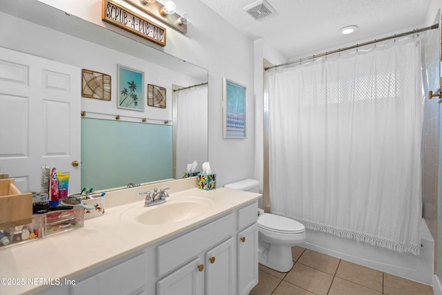 full bathroom with tile patterned flooring, vanity, toilet, shower / bathtub combination with curtain, and a textured ceiling