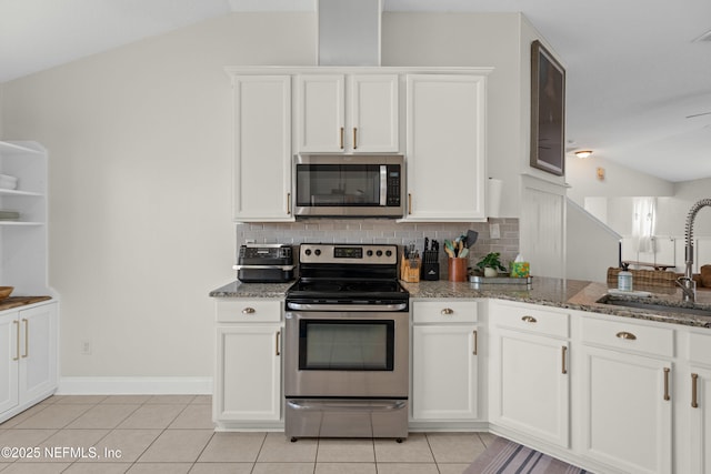 kitchen featuring stainless steel appliances, sink, and white cabinets