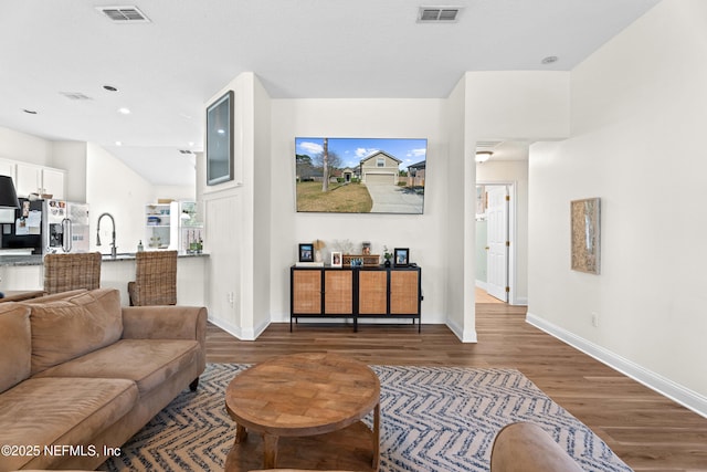 living room with dark hardwood / wood-style floors