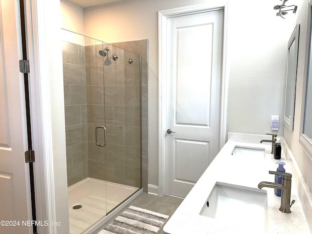 bathroom with vanity and an enclosed shower