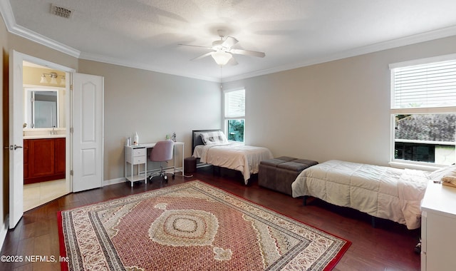 bedroom with ceiling fan, visible vents, dark wood-style flooring, and ornamental molding