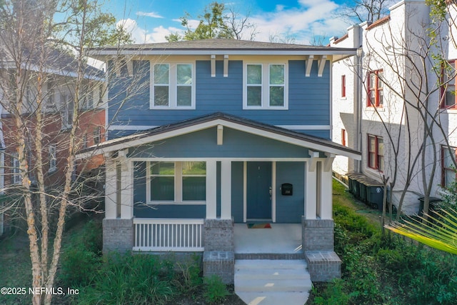 traditional style home with covered porch