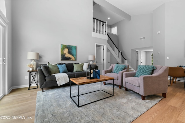 living room with light hardwood / wood-style floors