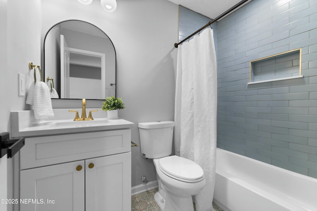 full bathroom featuring vanity, toilet, and shower / tub combo with curtain