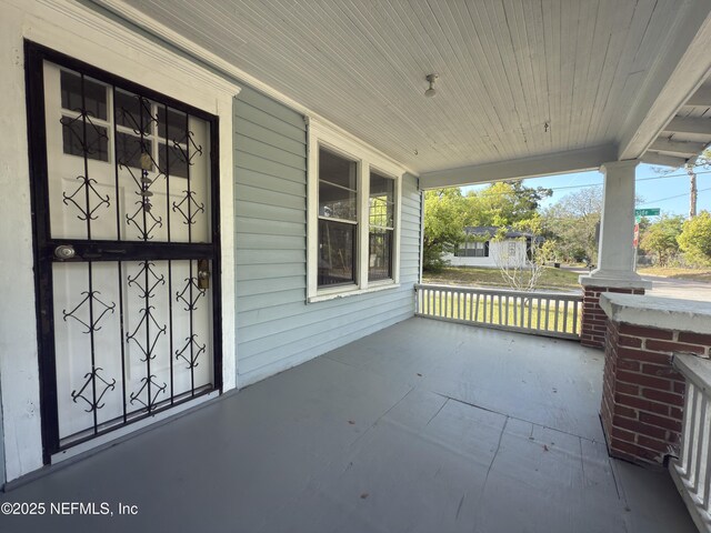 6624 Avalon St, Jacksonville, FL 32208 - view of patio featuring a porch