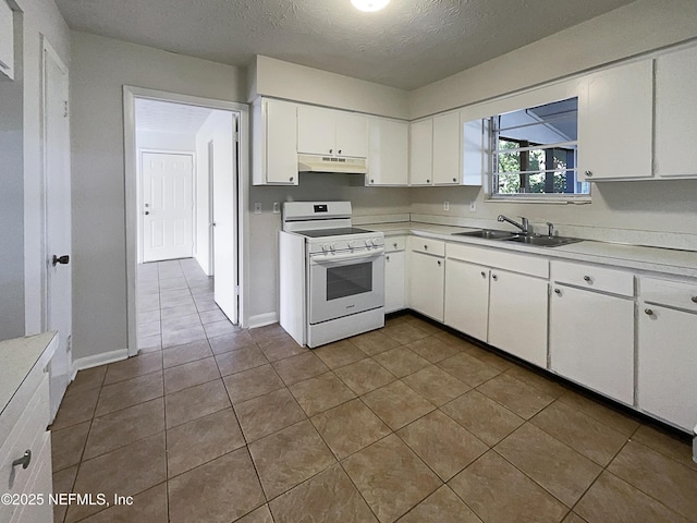 kitchen with under cabinet range hood, electric range, a sink, white cabinetry, and light countertops