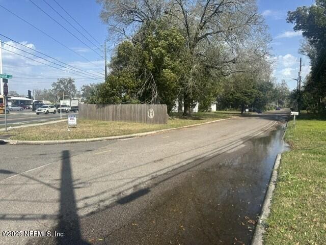 view of road with curbs