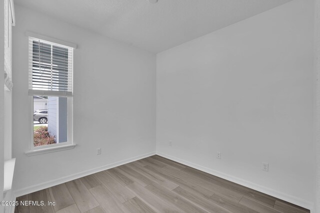 232 Fairlake Cir, Saint Augustine, FL 32092 - spare room featuring wood finished floors