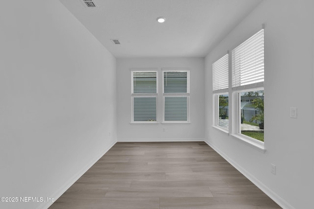 232 Fairlake Cir, Saint Augustine, FL 32092 - unfurnished room featuring light wood-style flooring and baseboards