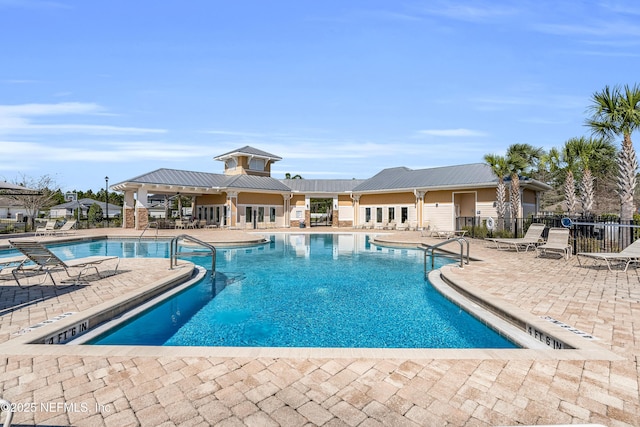 view of pool featuring a patio area