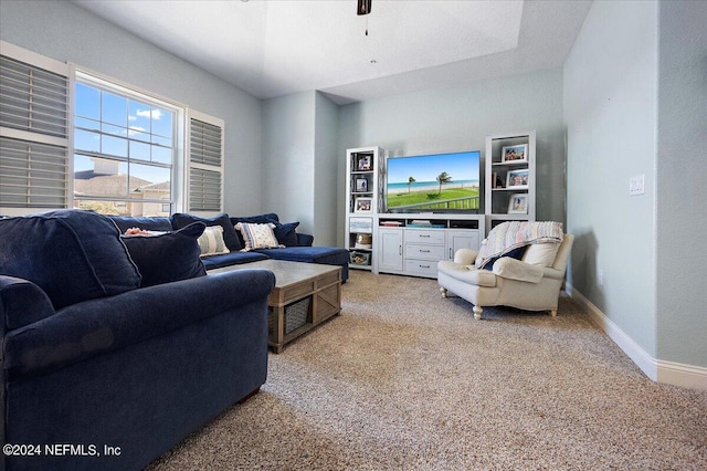 living room featuring light carpet